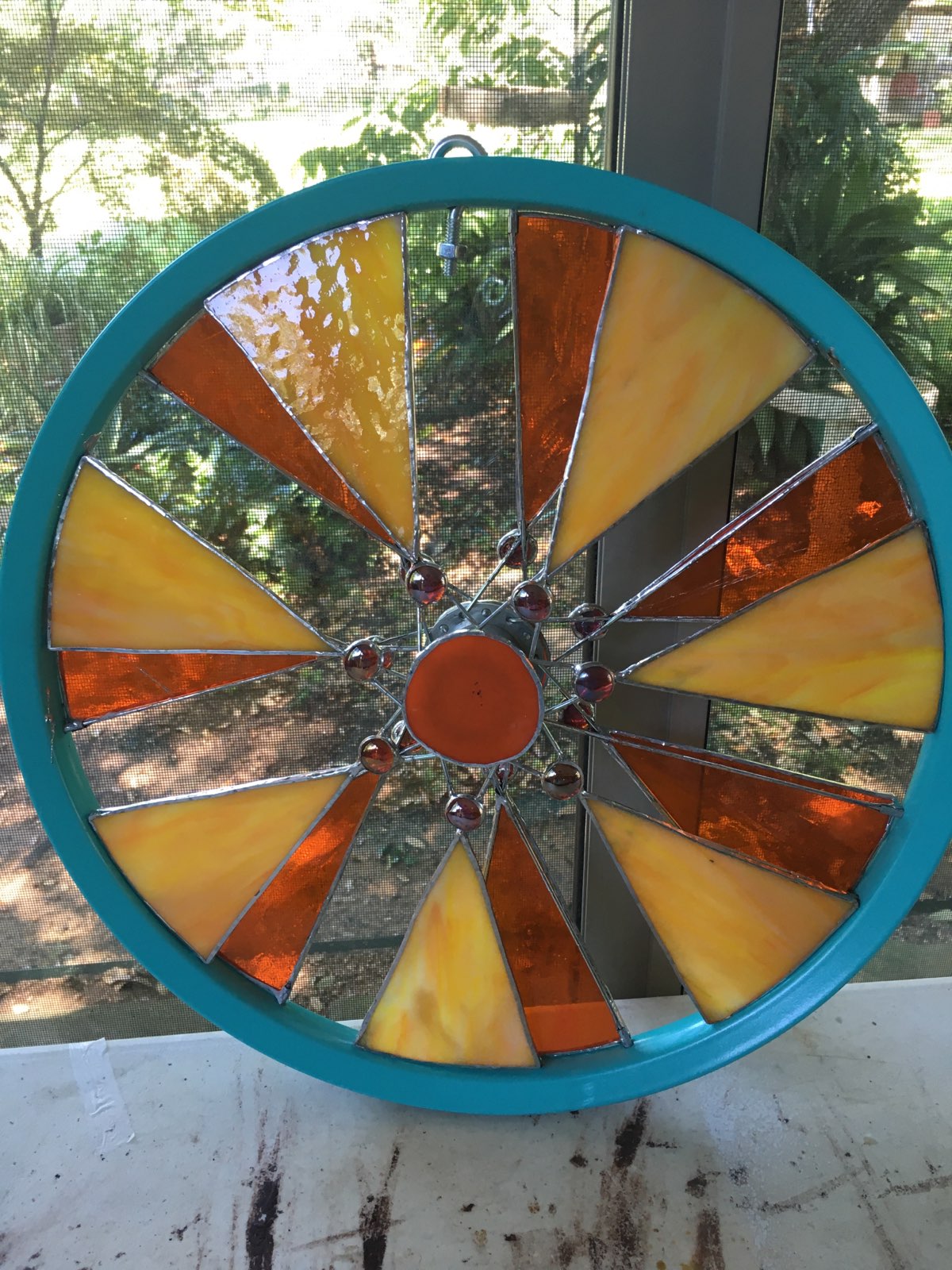 stained glass bicycle wheel